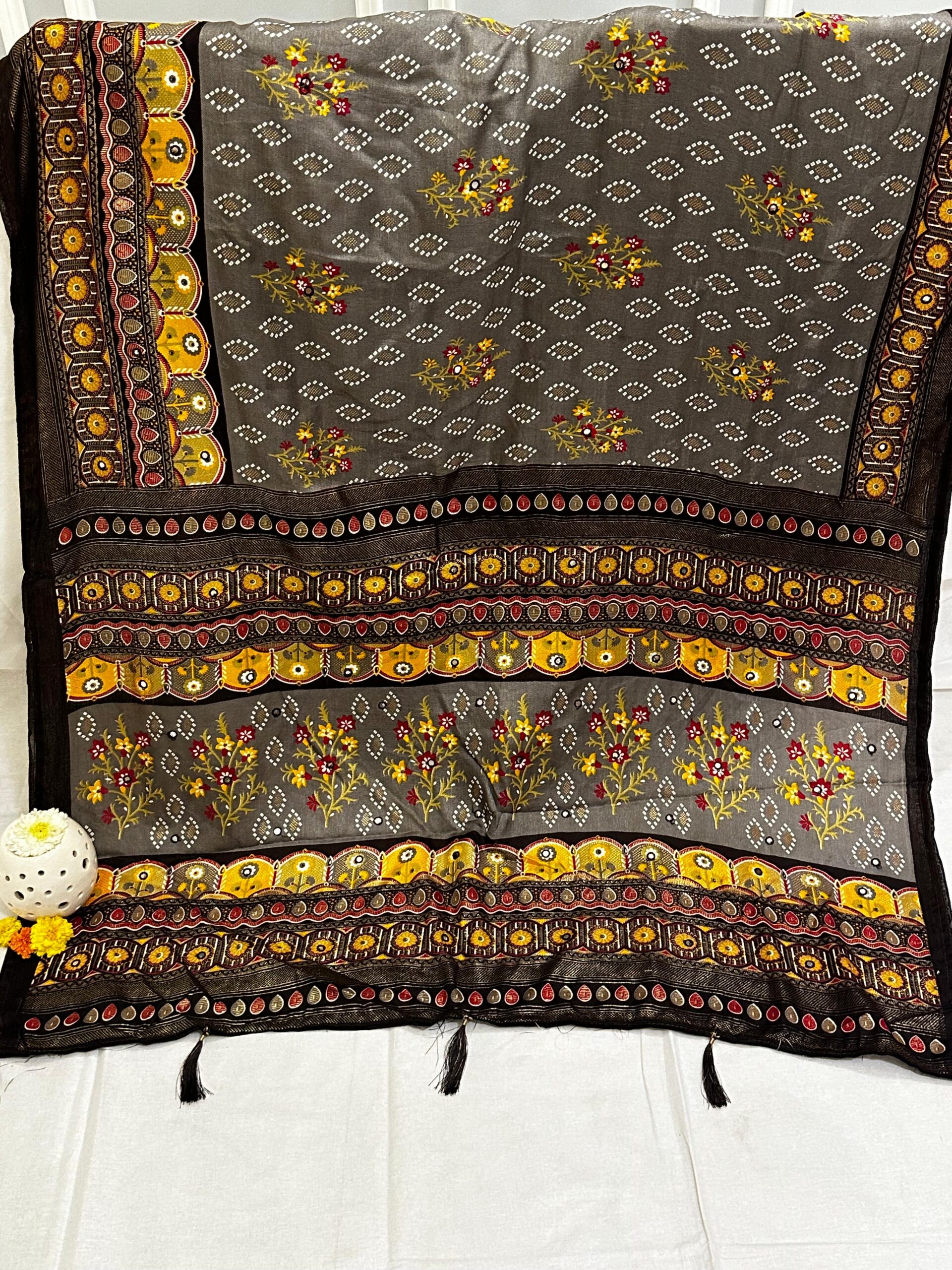 Vibrant Kalamkari fabric showcasing intricate hand-painted designs.